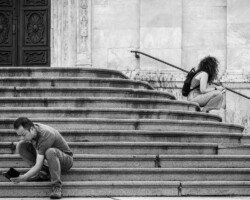 On the stairs of the Duomo